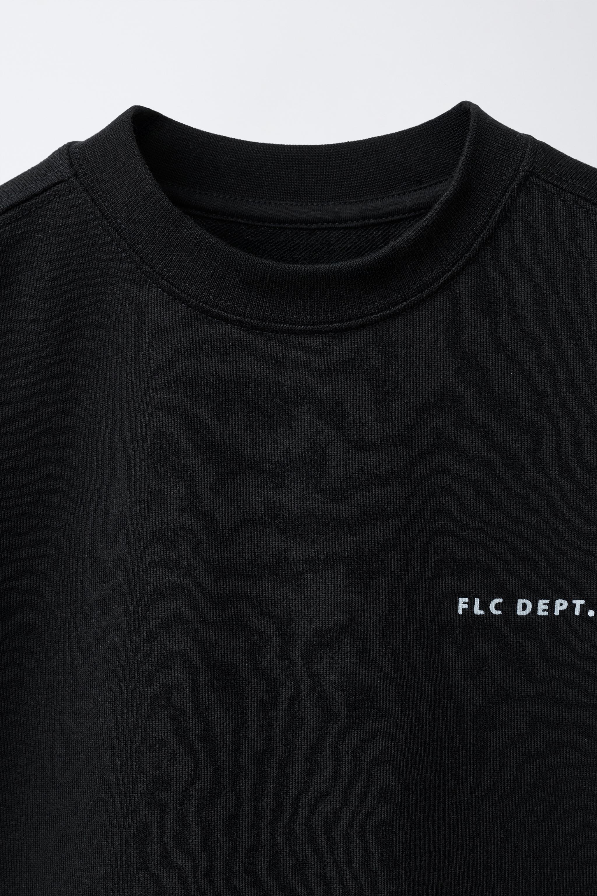 SHORT SLEEVE RAISED TEXT SWEATSHIRT